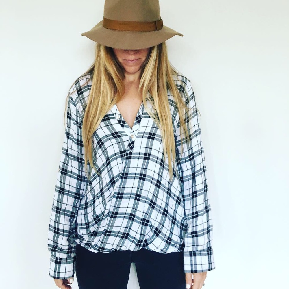 Cross from plaid blouse